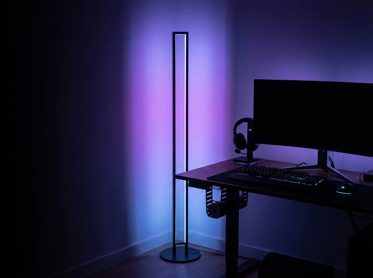 RGBIC floor lamp purple blue gradient in gaming room next to desk and monitor